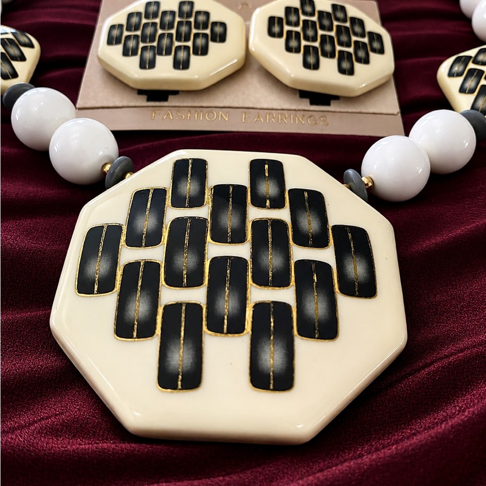 Handcrafted Ceramic Necklace with matching studs earrings.